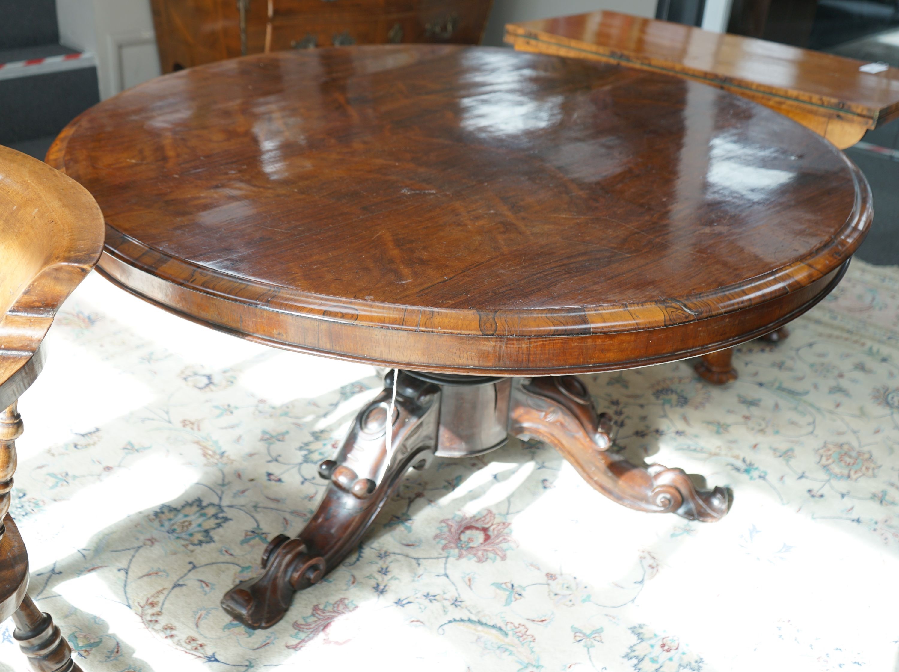 A Victorian circular rosewood tilt top breakfast table, diameter 136cm, height 72cm